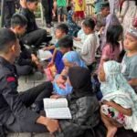 Usai Kerusuhan Tallo, Brimob Bangun Penampungan Air hingga Bimbing Anak Mengaji