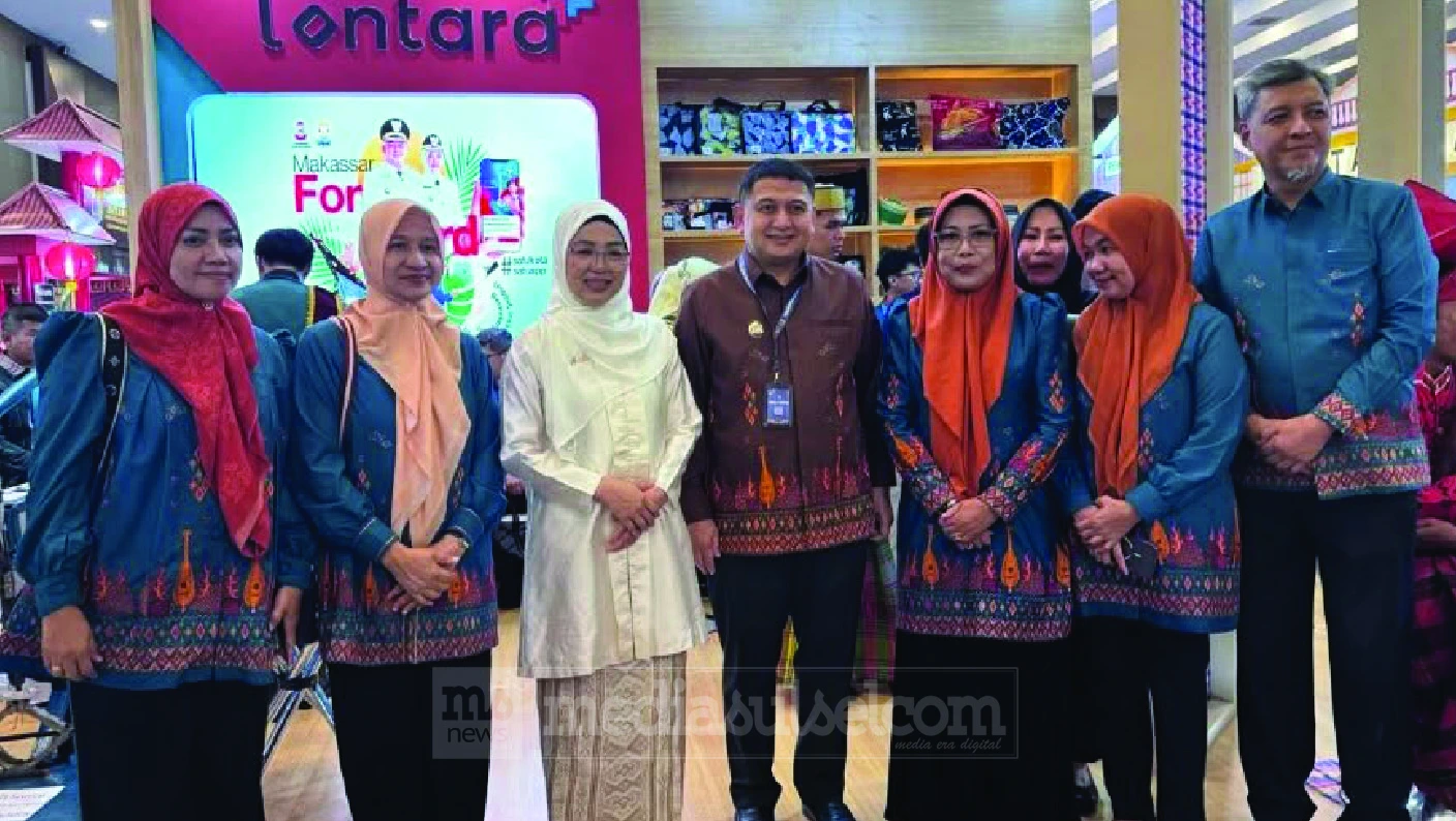 Kepala Dinas Pertanahan Kota Makassar Sri Sulsilawati bersama delegasi Pemkot Makassar pada Rakernas APEKSI XVIII di Medan