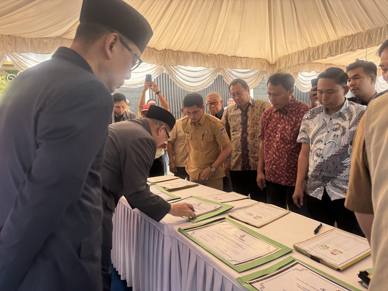 Serah terima aset PSU perumahan Makassar