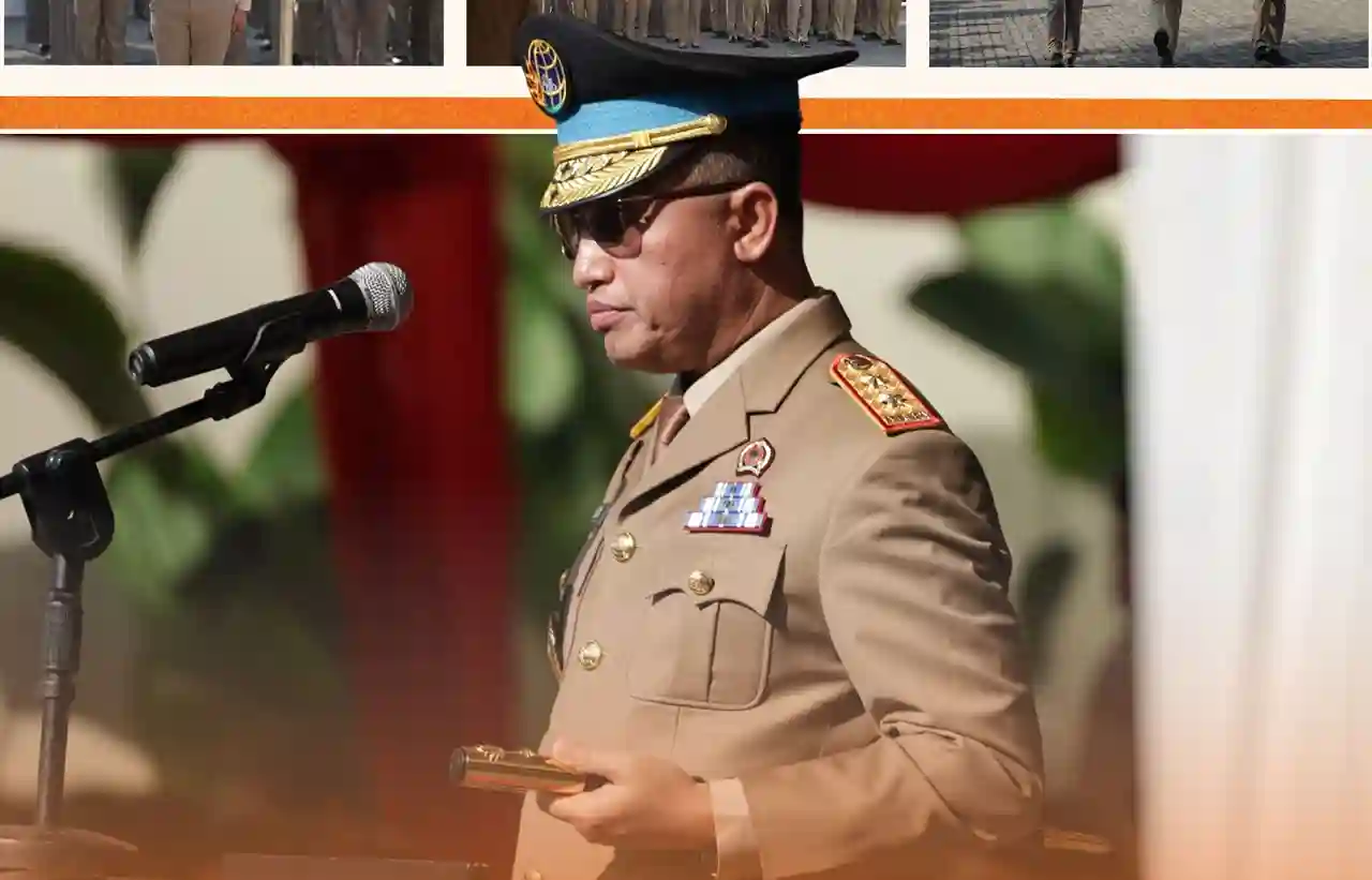 Pejabat berseragam upacara berdiri di depan mikrofon pada peringatan HANTARU 2026 di Kanwil BPN Sulawesi Selatan