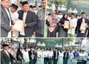 Wali Kota Makassar Munafri Arifuddin menyerahkan sertipikat tanah wakaf kepada masyarakat dan pengelola lembaga keagamaan dalam rangka memperingati Hari Santri Nasional 2026, sebagai wujud komitmen ATR/BPN Kota Makassar dalam memberikan kepastian hukum atas tanah wakaf. (doc istimewa)
