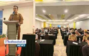 Sekretaris Dinas Penataan Ruang Kota Makassar, Andi Zainal Abidin Takko, S.E., saat membacakan sambutan Kepala Dinas dalam kegiatan Sosialisasi Sertifikat Laik Fungsi (SLF). doc istimewa