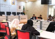 Pertemuan Kantah Makassar dan Dinas Perumahan dan Permukiman di Aula Pa'bicara Butta membahas sertipikasi PSU pada 23 Oktober 2026